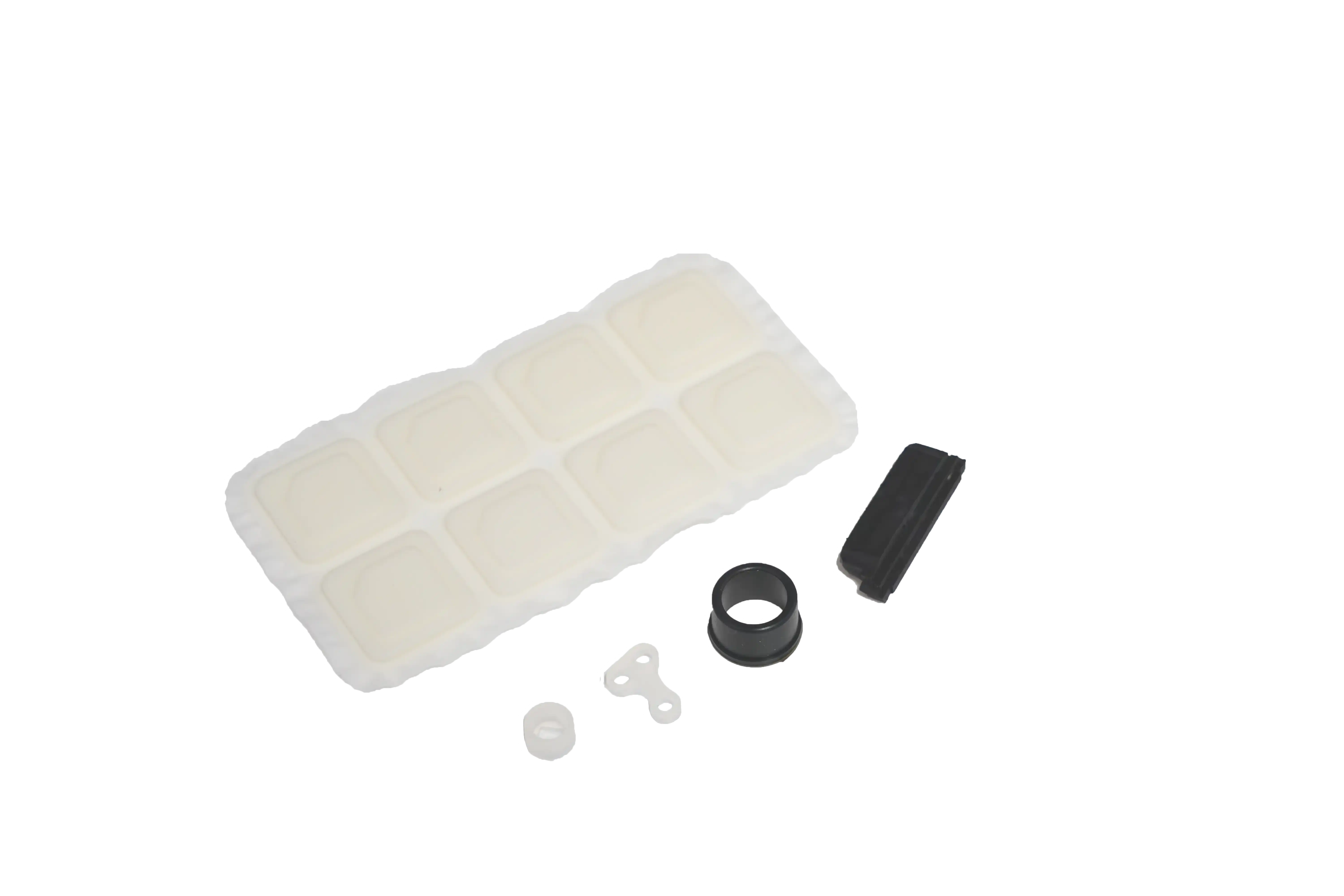 Translucent molded rectangular keypad and separate small black and white molded components