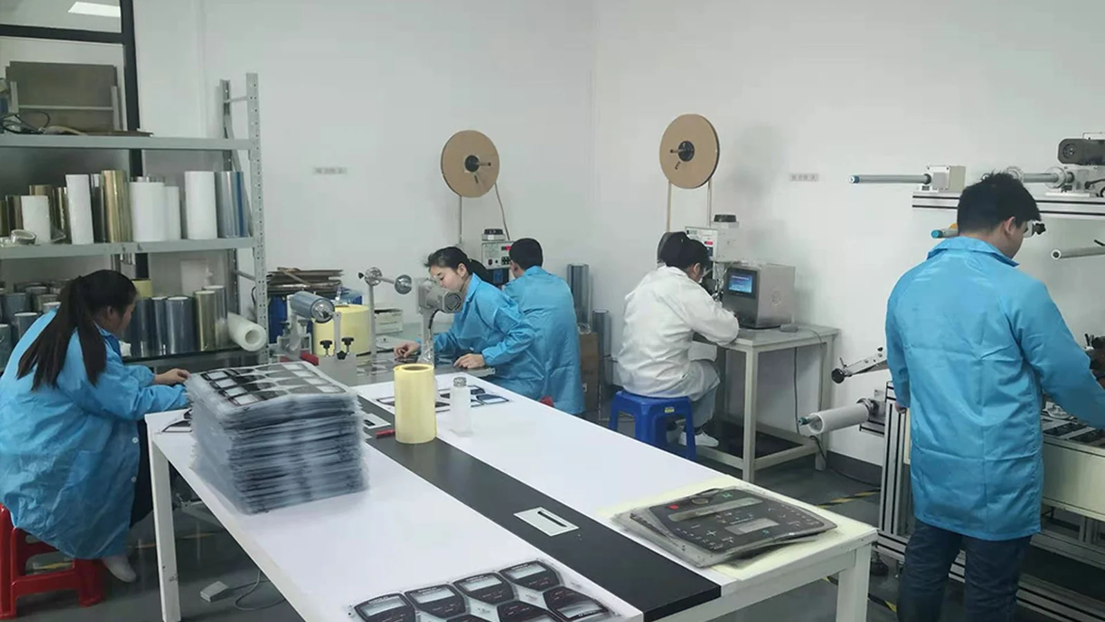Factory lamination assembly for a graphic overlay