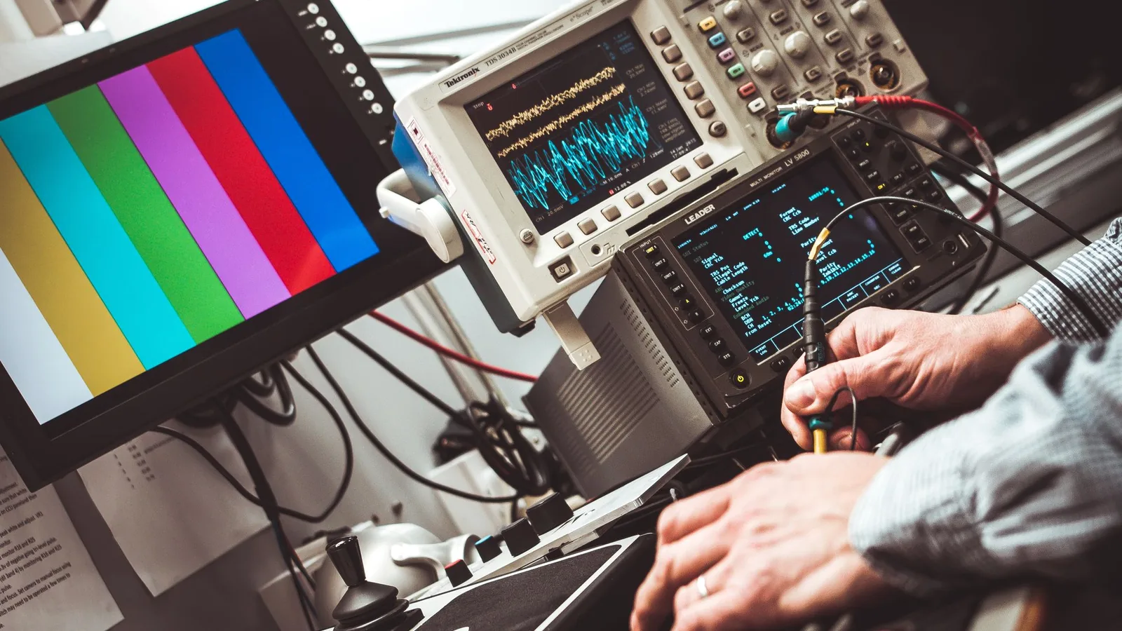 Technician testing electronic instrumentation