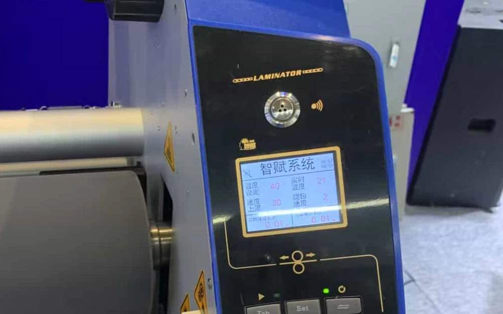 Powered machine control panel with an active display window, membrane keys, and status lights