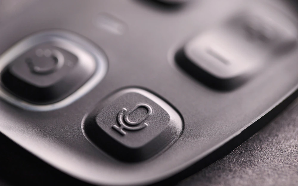 Close-up of a real molded silicone keypad installed in a rigid front-panel bezel