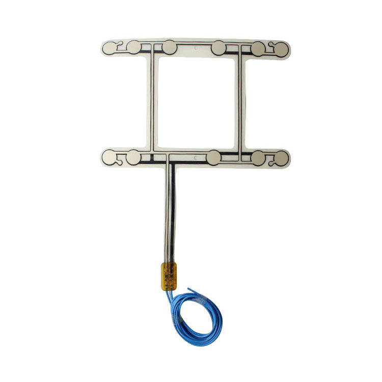 H-shaped seat sensor with several circular sensing zones and blue wire leads