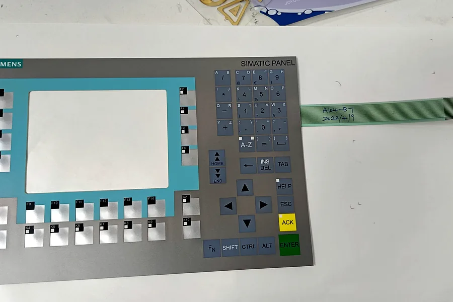 Industrial control panel with membrane keys and display window