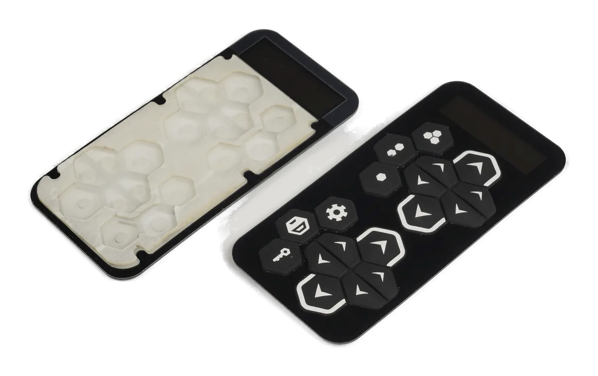 Real silicone keypad shown from the front and rear with molded key cavities