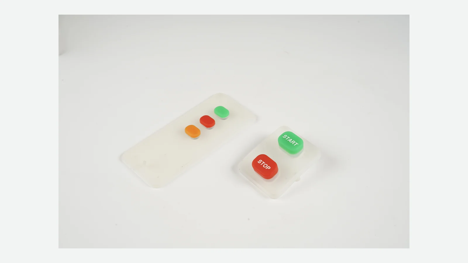 Real silicone rubber keypad assemblies with raised start and stop keys