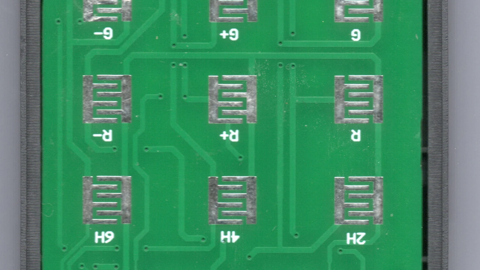 Interdigitated PCB contact patterns for a conductive rubber keypad