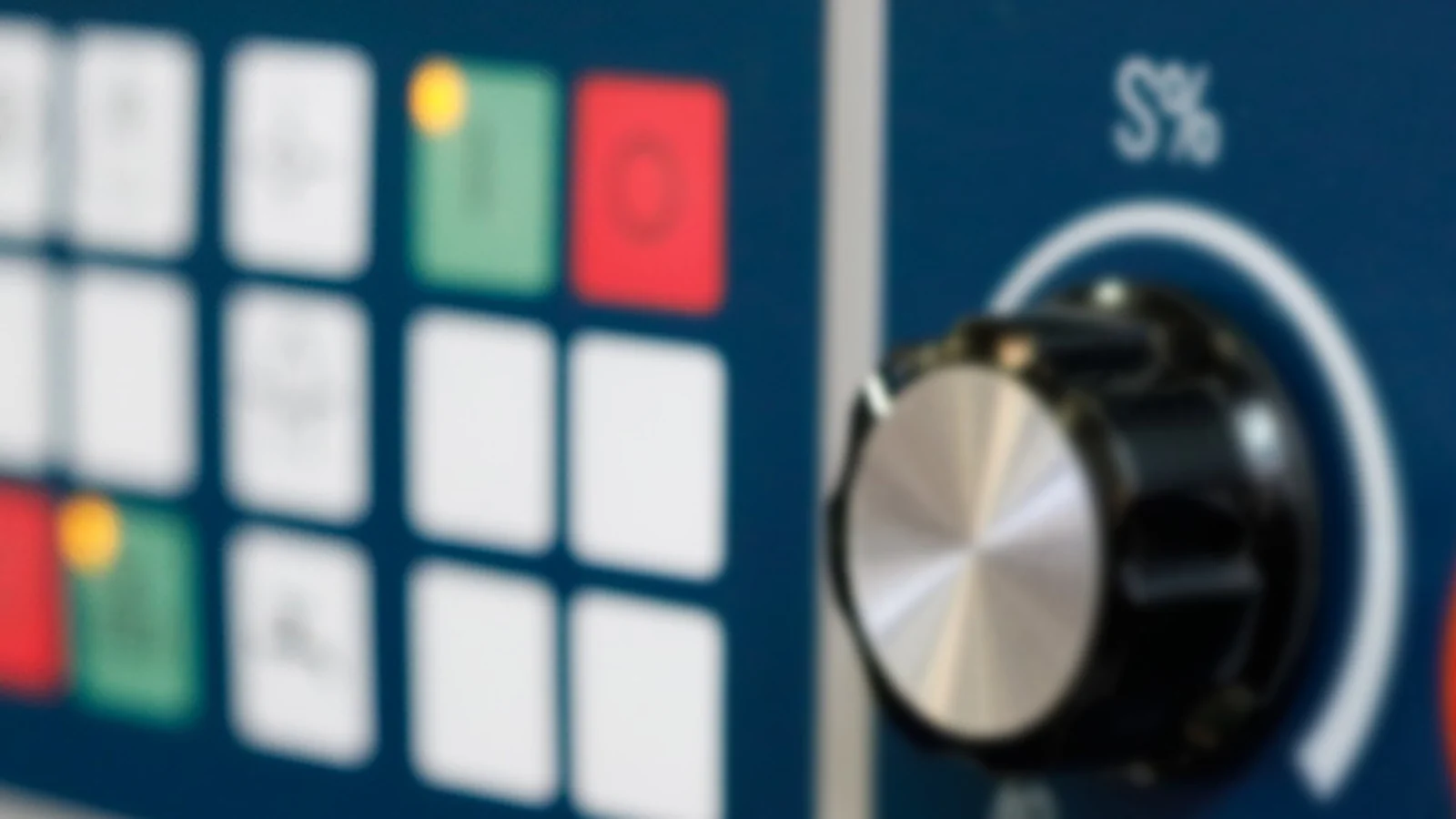 Illuminated industrial control panel used to review legend visibility
