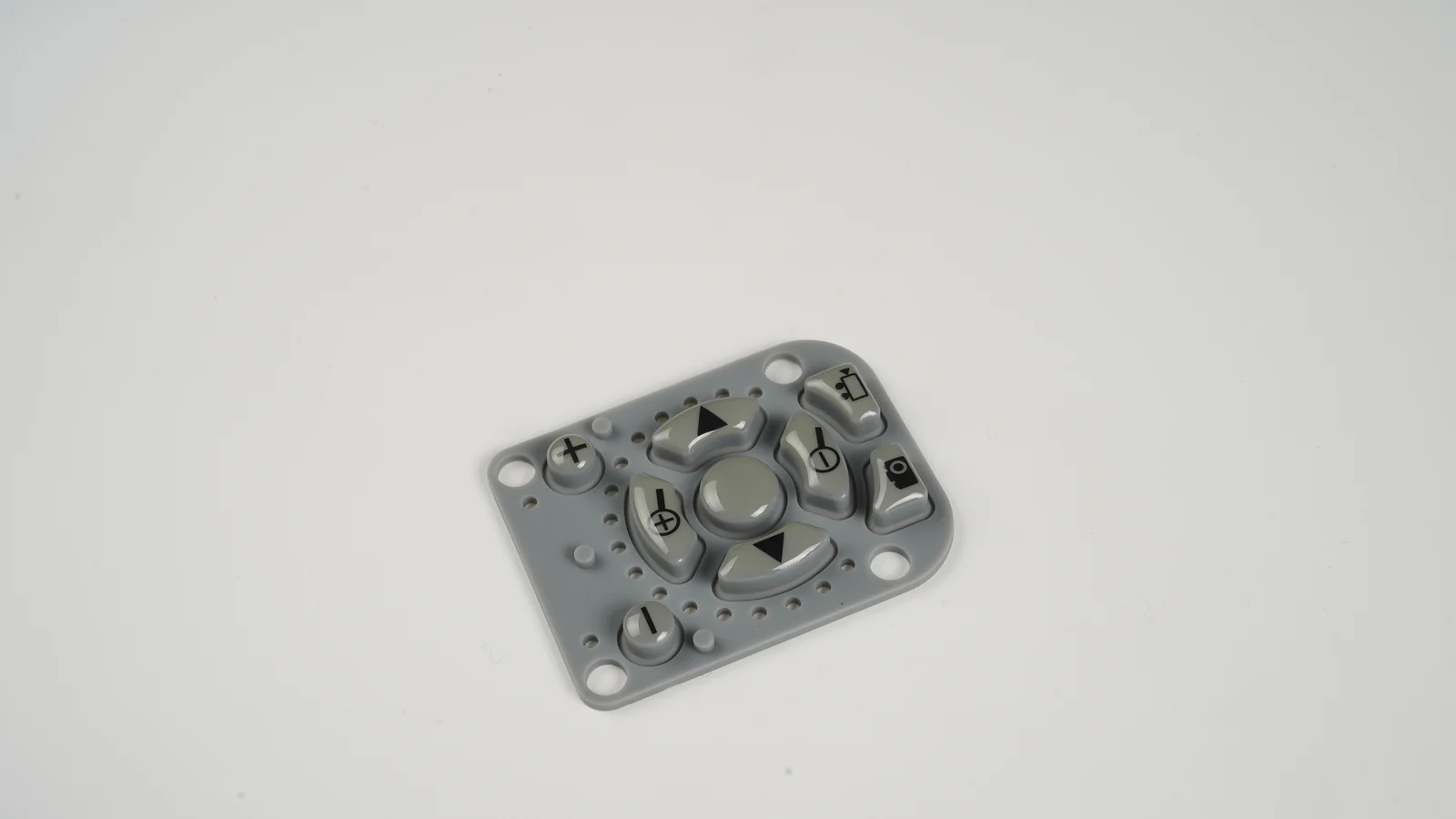 Molded silicone keypad with perimeter flange and retention holes